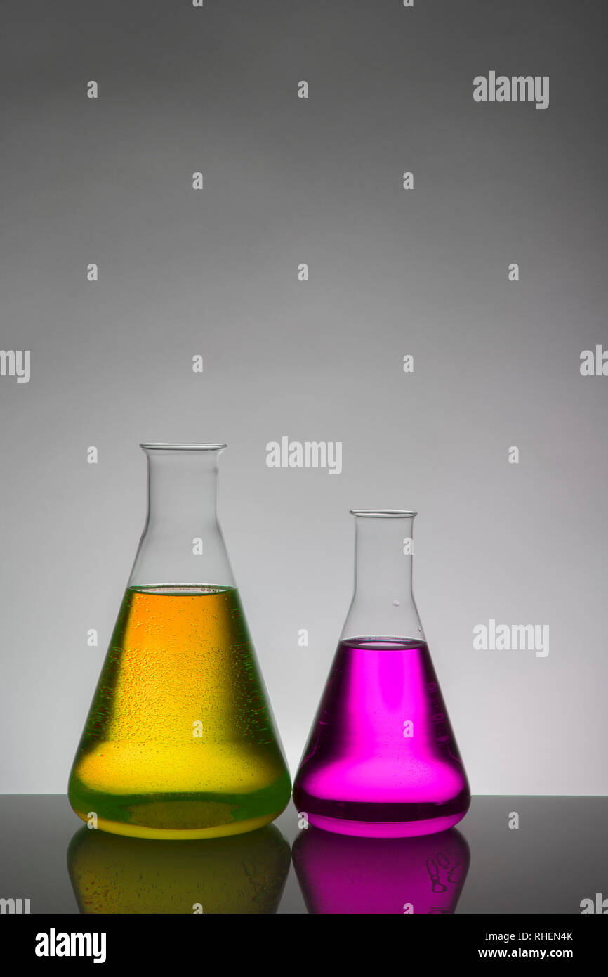Liquid in laboratory bottles. Scientific biochemical laboratory ...