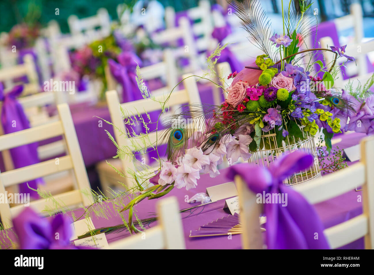 Floristics. Bridal bouquet and boutonniere with a green ribbon on a dark  wooden background. Flowers: anemone zamiokulkas asparagus aaspedistra.  Weddin Stock Photo - Alamy, image size:1300x956