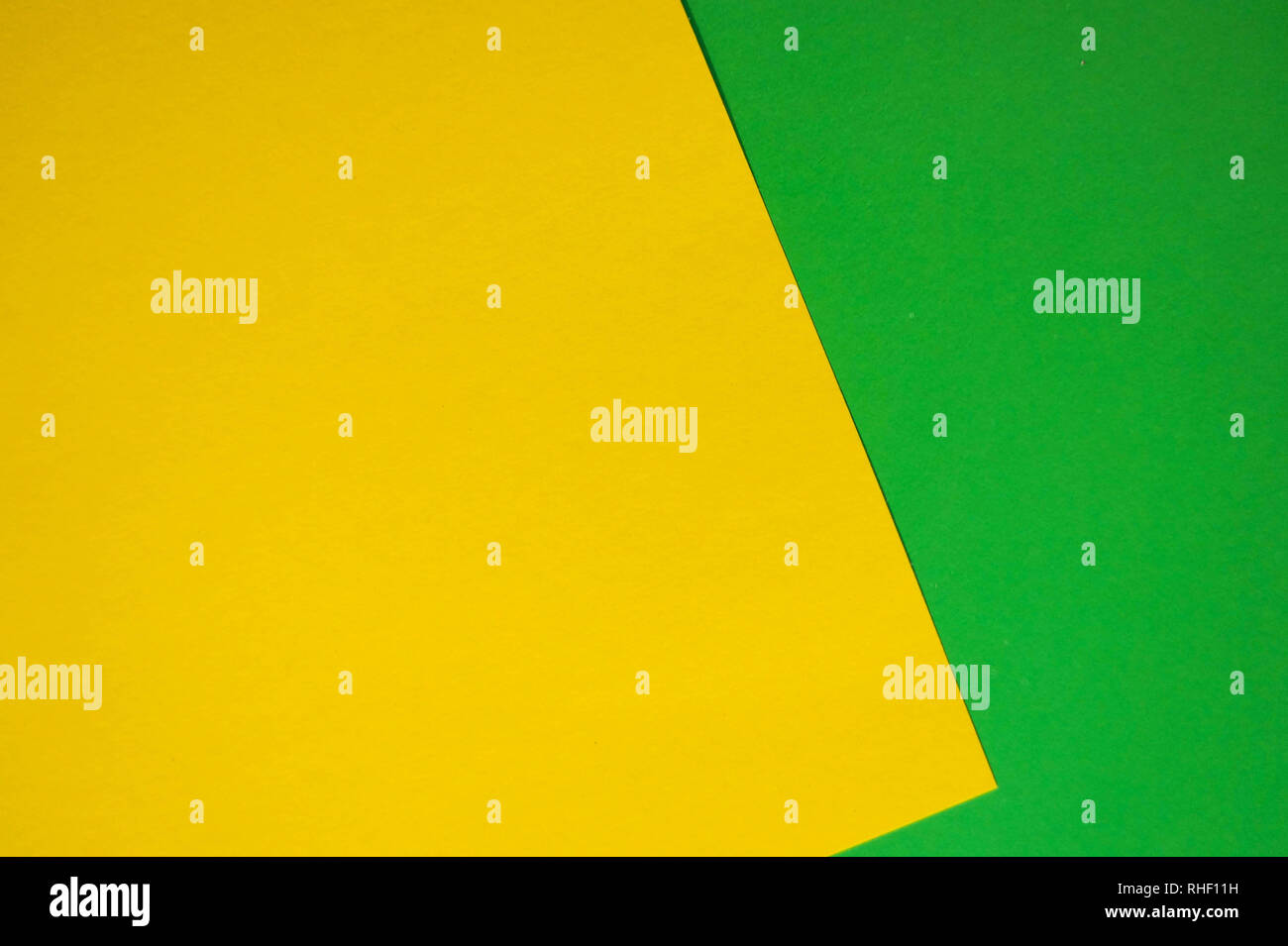 Fashion flat lay background with color paper sheets. Yellow and green ...