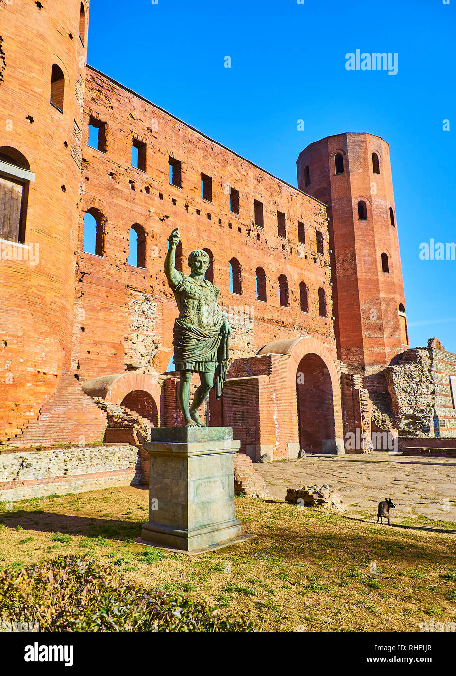 Statue of Augustus Caesar in front of Porta Palatina Gate. Piazza Cesare Augusto square. Turin, Piedmont, Italy. Stock Photo