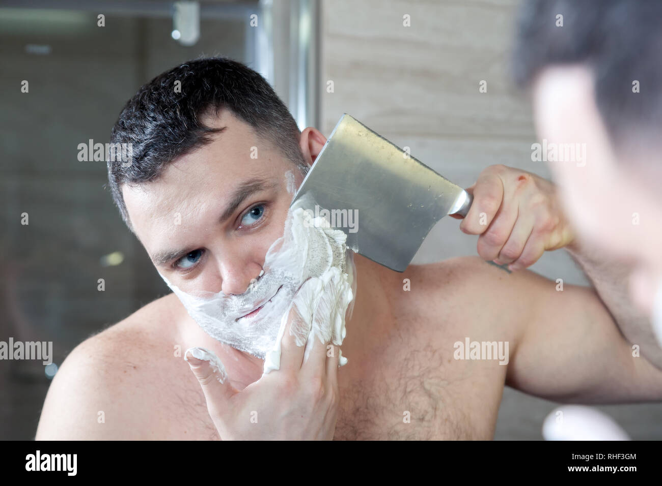 Shaving man by big knife. Concept brutal caucasian men with