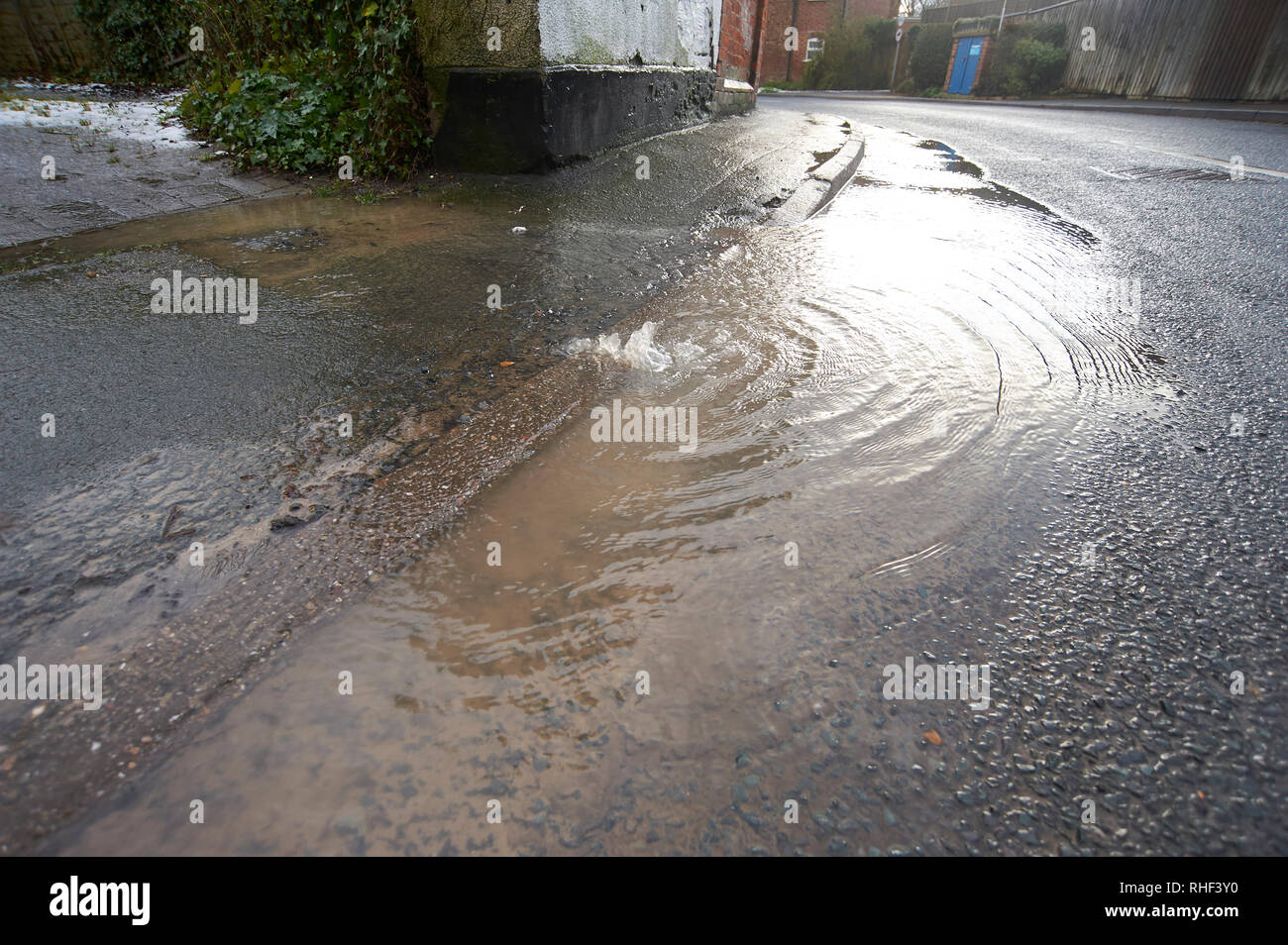 Burst water main (Pipe) in a main road Stock Photo Alamy