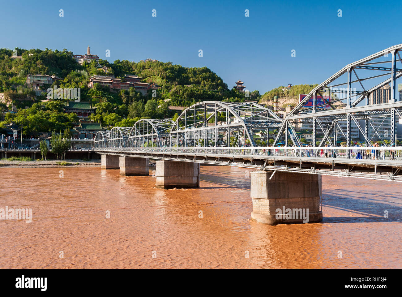 The Zhongshan Bridge in Lanzhou (China) during a sunny afternoon Stock Photo