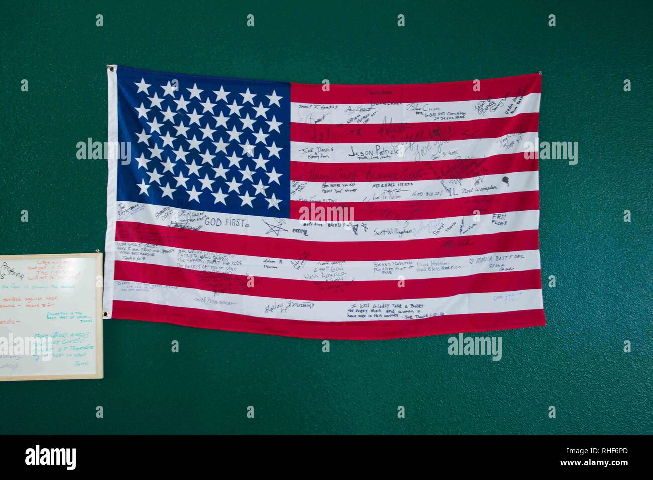 Flag hanging in the bunkhouse of the Malheur National Wildlife Refuge during the 'Bundy Occupation' signed by all of the occupiers and some vistors. Stock Photo