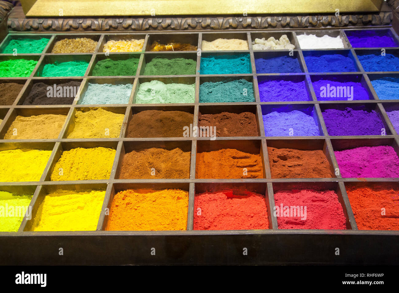 Brightly coloured powdered pigments in the colours of the spectrum for art and painting, Venice, Veneto, Italy displayed in a specialist art supply st Stock Photo