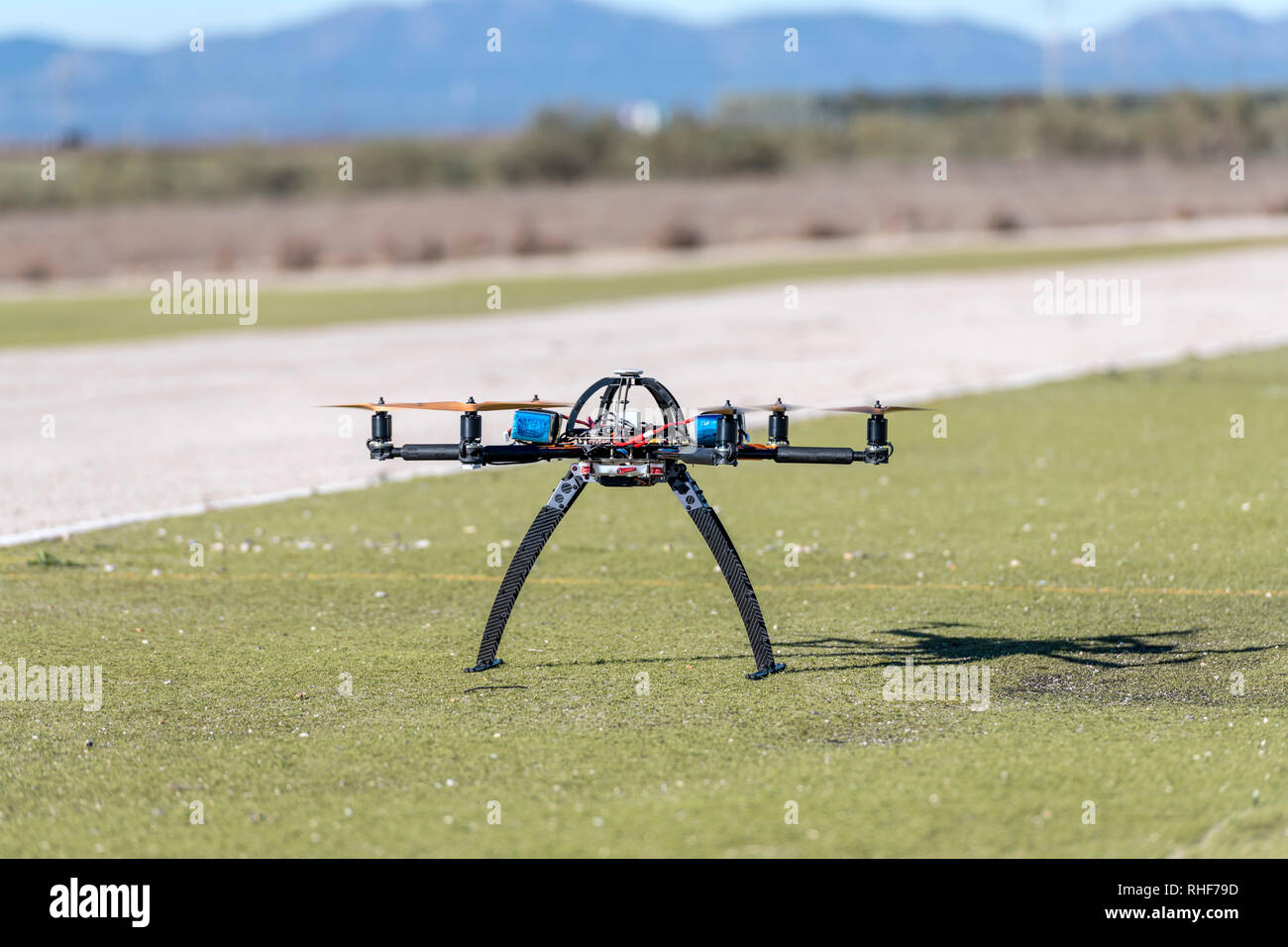 Professional drone before a flight in a test airfield Stock Photo