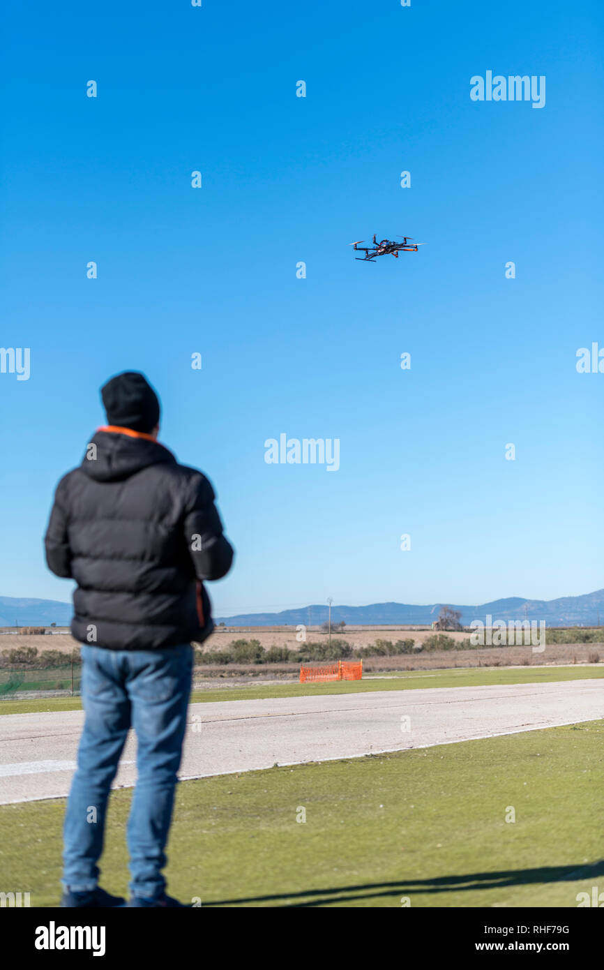 Professional drone flying and remote pilot in the airfield Stock Photo