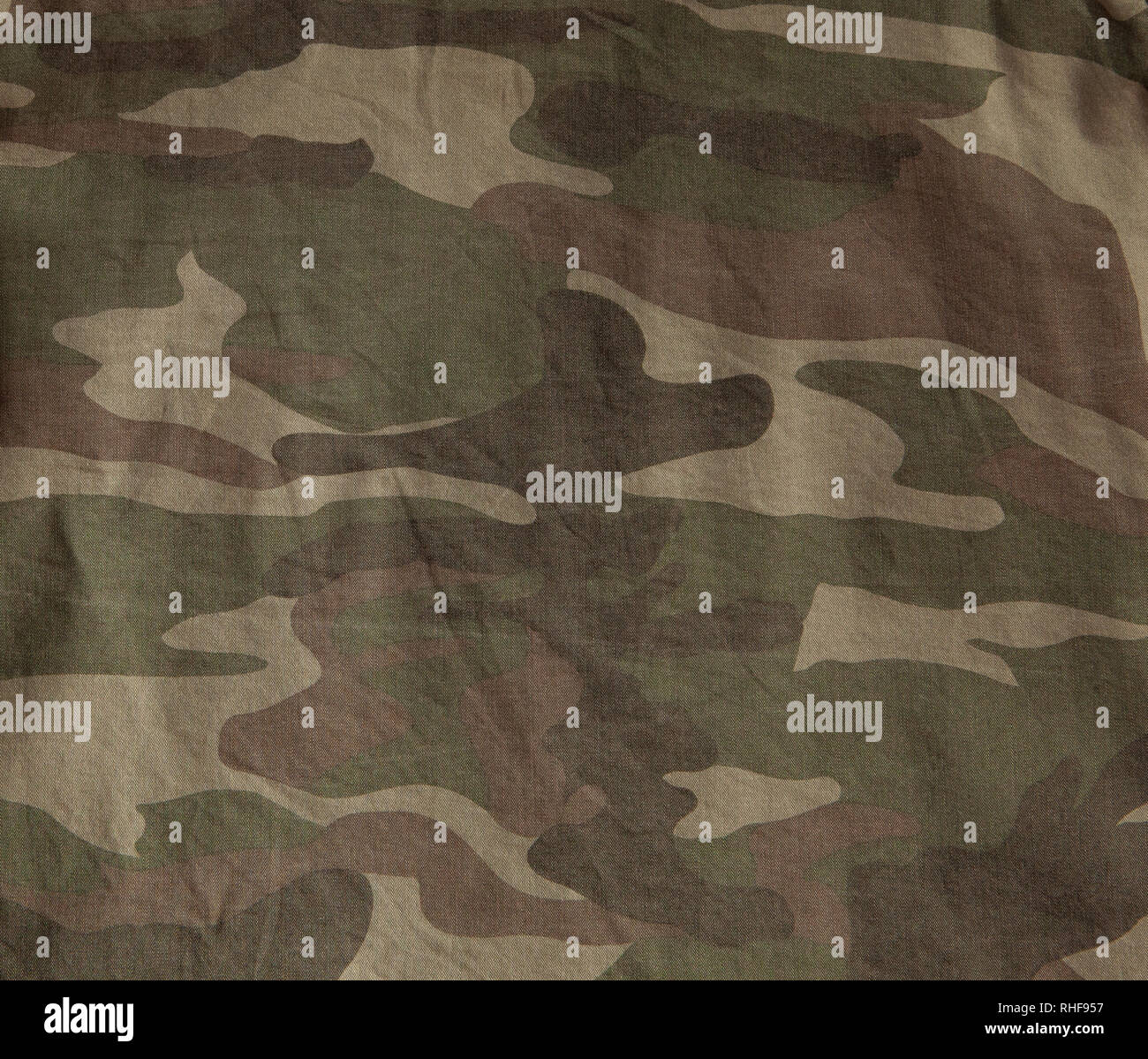 Closeup of military uniform surface. Texture of fabric, closeup