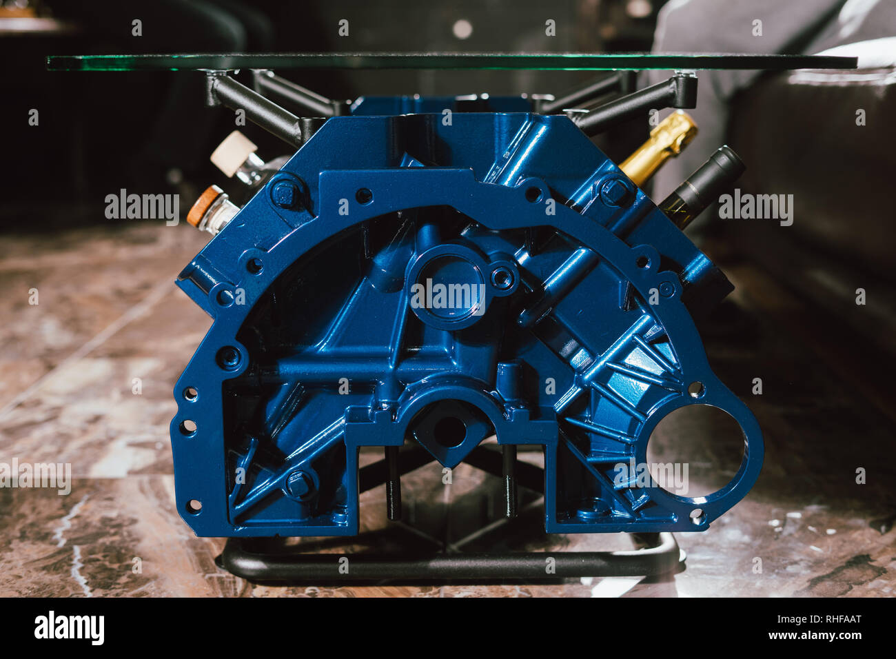 V8 Engine block table, painted in blue color. Loft stylish table