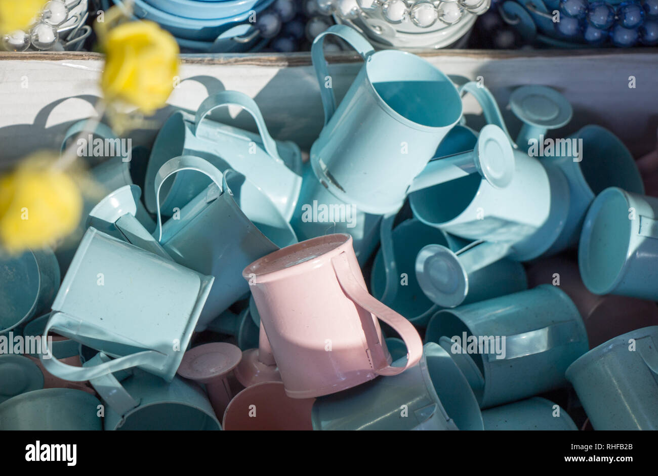 Set of colorful watering cans made of metal Stock Photo Alamy