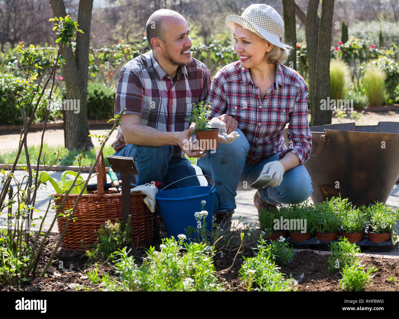 Mature couple gardening tools in hi-res stock photography and images ...
