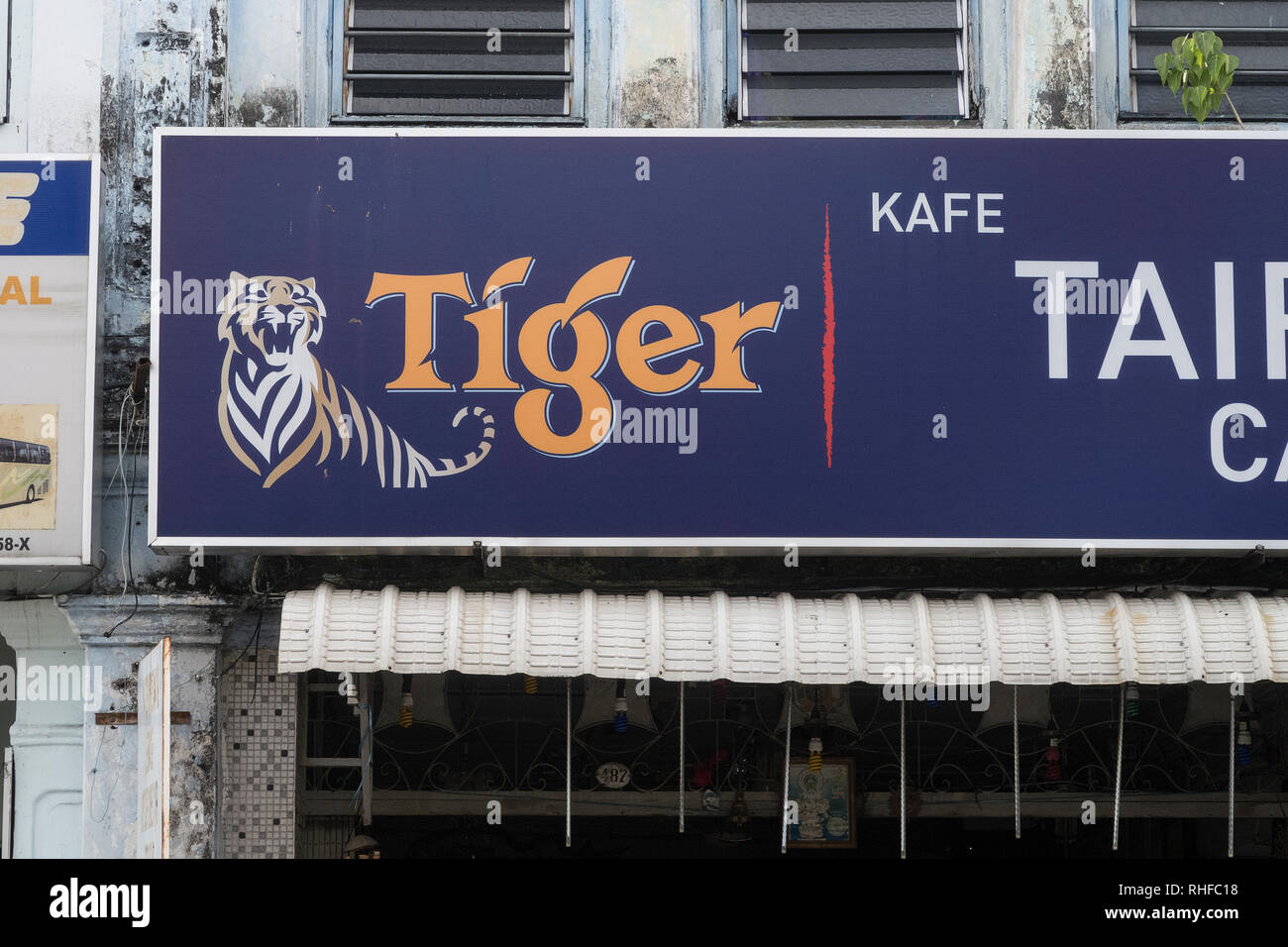 Penang, Malaysia - July 30, 2018: Advertisement board on a cafe in Penang, Malaysia advertisering Tiger beer, a well known beer brand in Asia Stock Photo