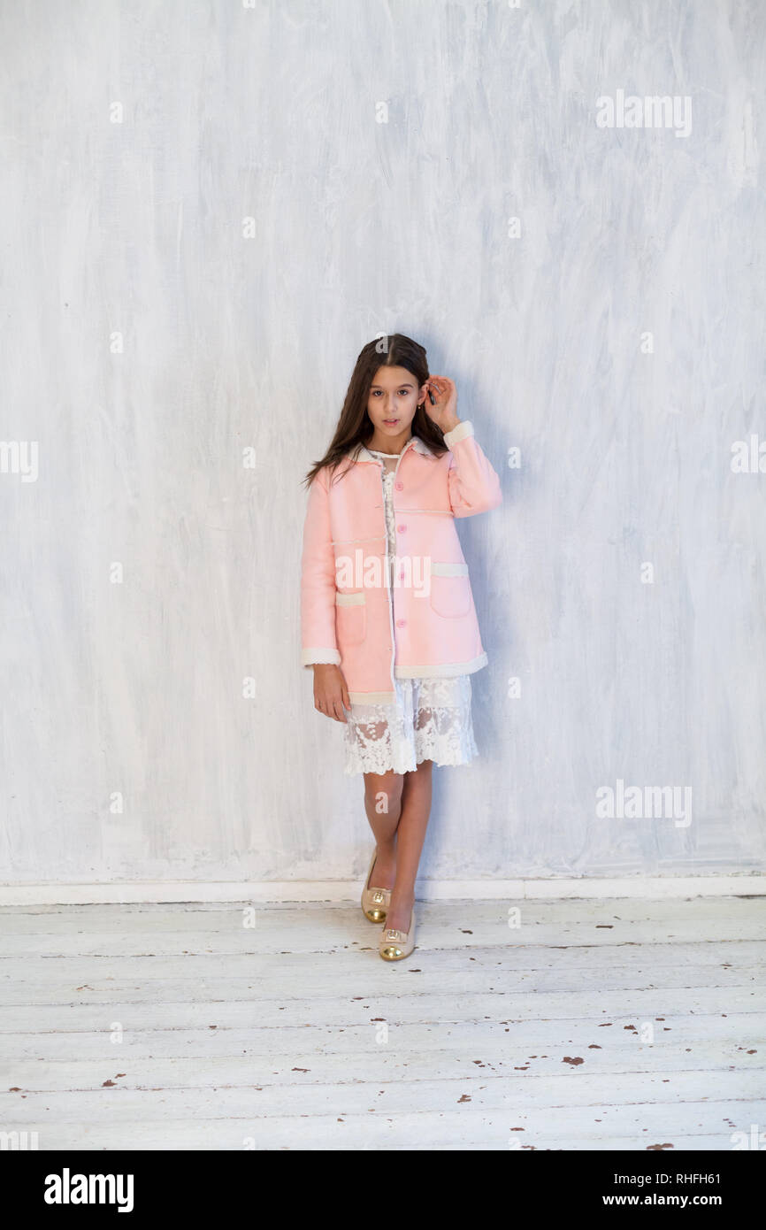 Portrait of beautiful fashion girl in a pink dress Stock Photo - Alamy