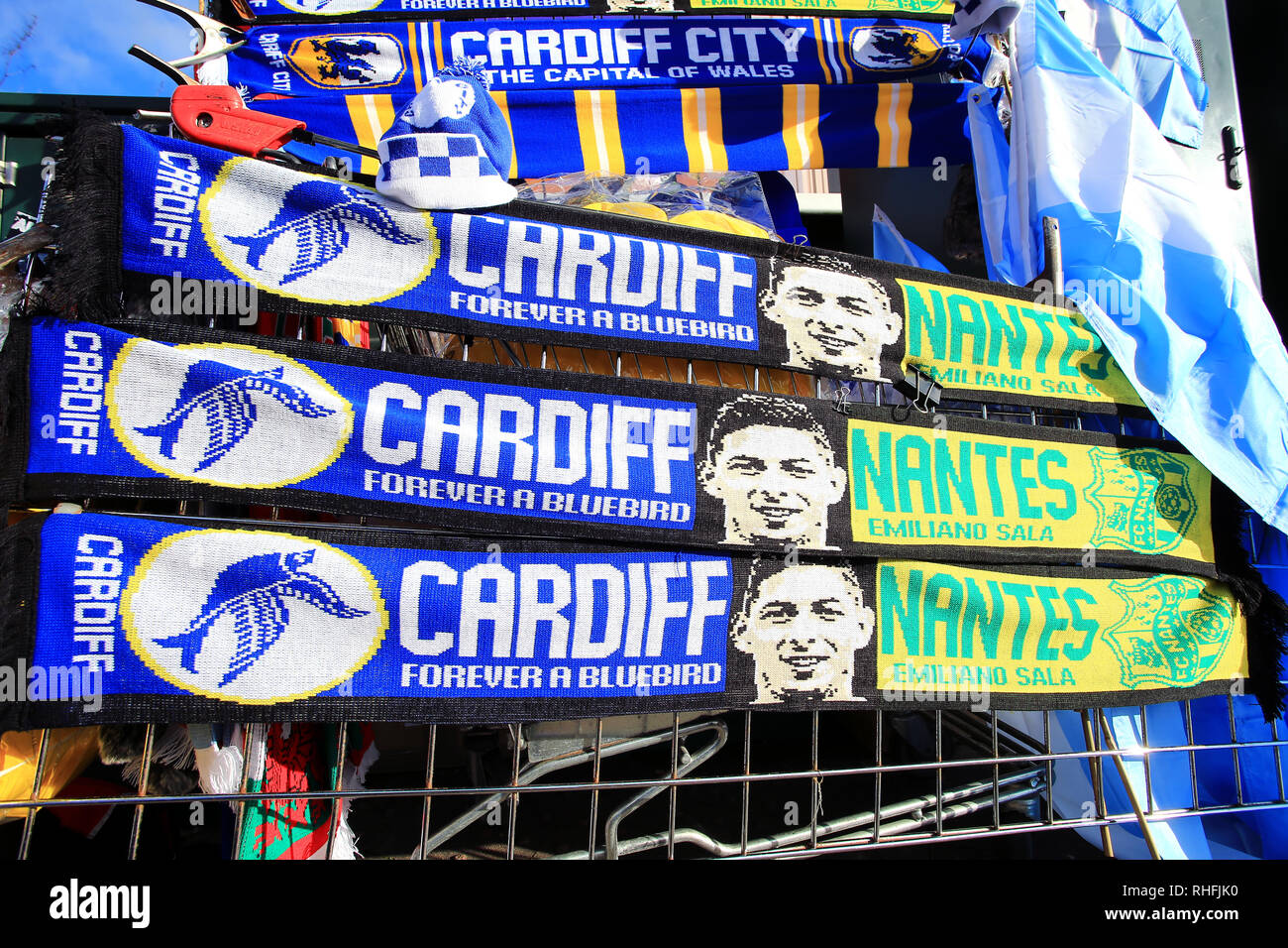 A view of half and half scarves placed outside Cardiff City Stadium in  tribute to Emiliano Sala during the Premier League match at the Cardiff  City Stadium Stock Photo - Alamy