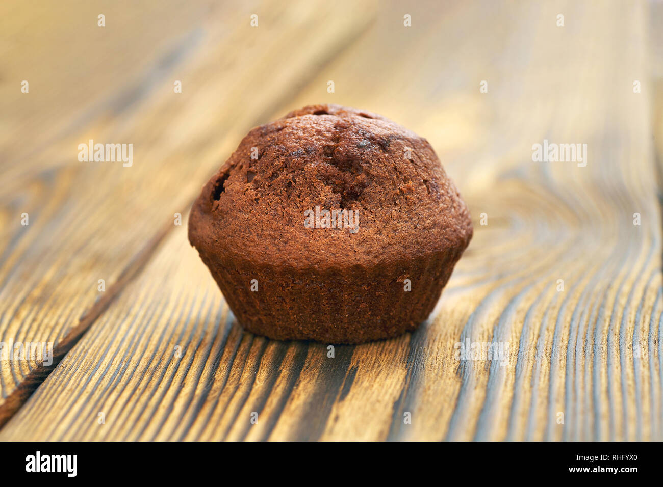 Chocolate muffins with edible eyes in paper holders Stock Photo - Alamy