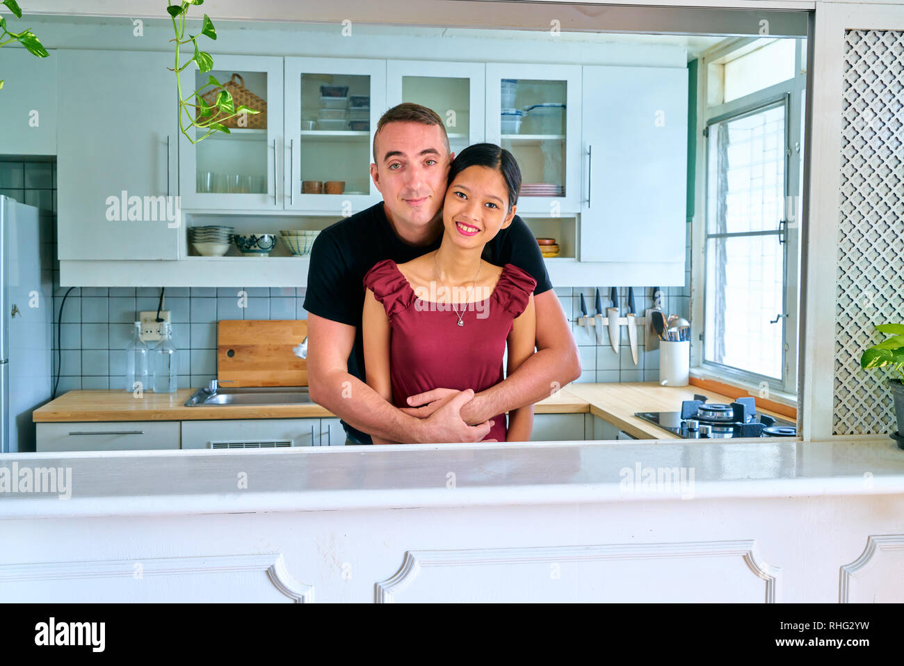 Asian lovely couple hugging hi-res stock photography and images - Alamy