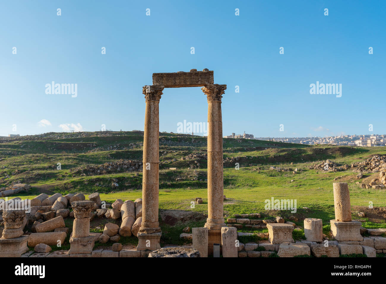 Ancient ruined architecture with meadow in Jerash, Amman, Jordan Stock Photo