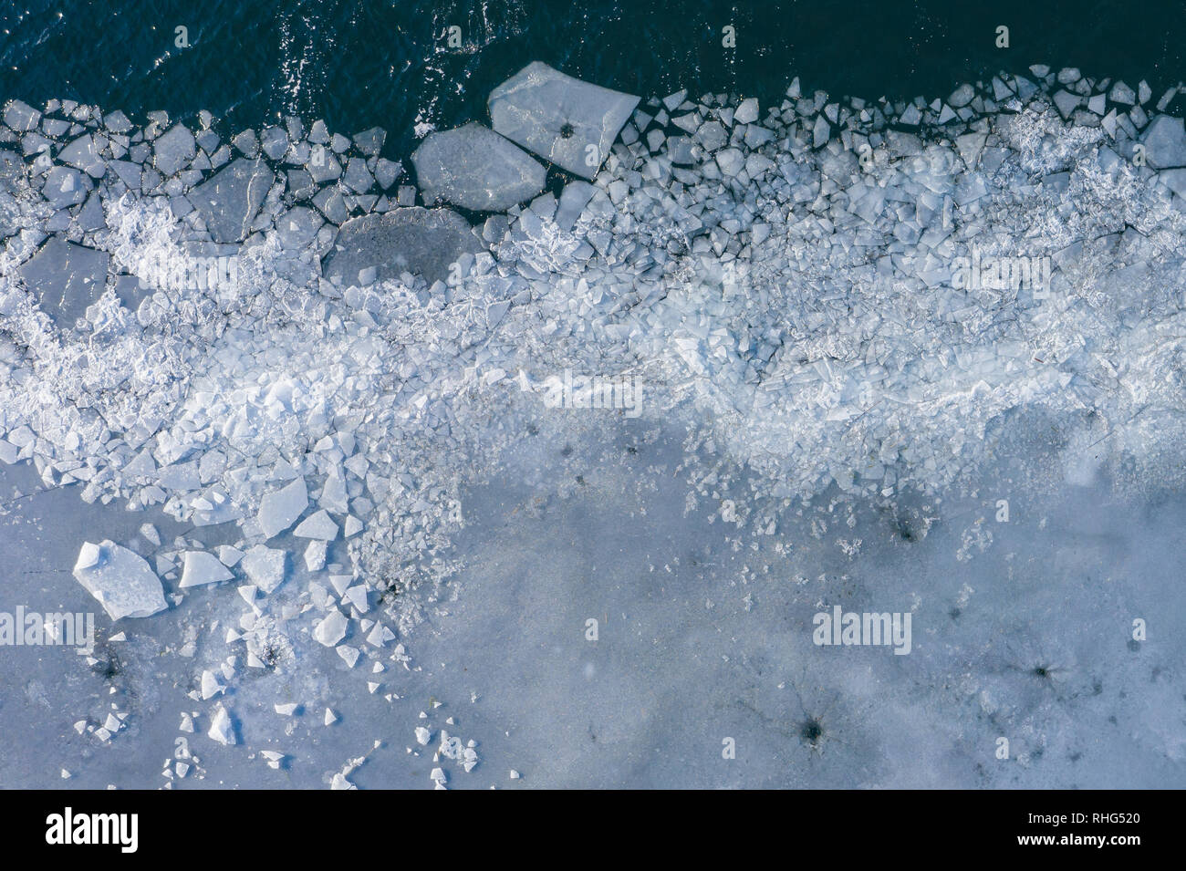 Glacier Lagoon with icebergs from above. Aerial View. Cracked Ice from ...