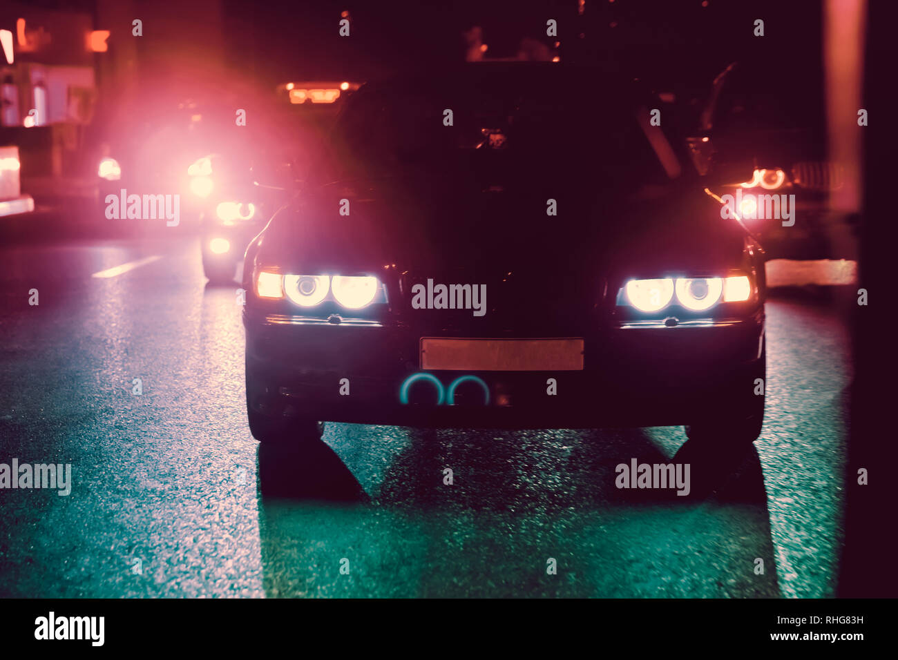 Night view of the cars. Road in the city at the night with yellow and