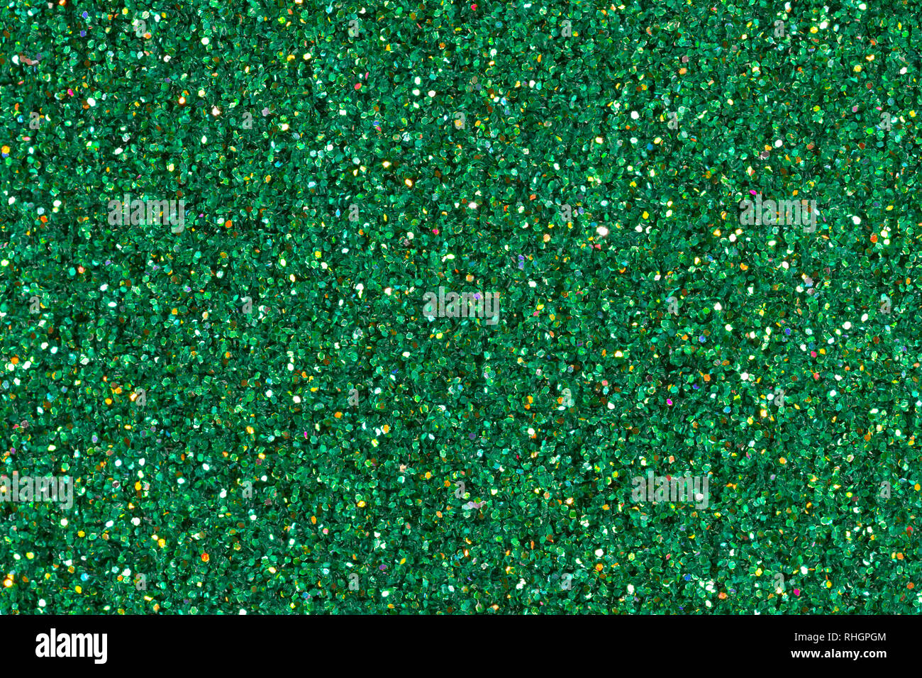 Green glitter background with emerald for your unique project Stock