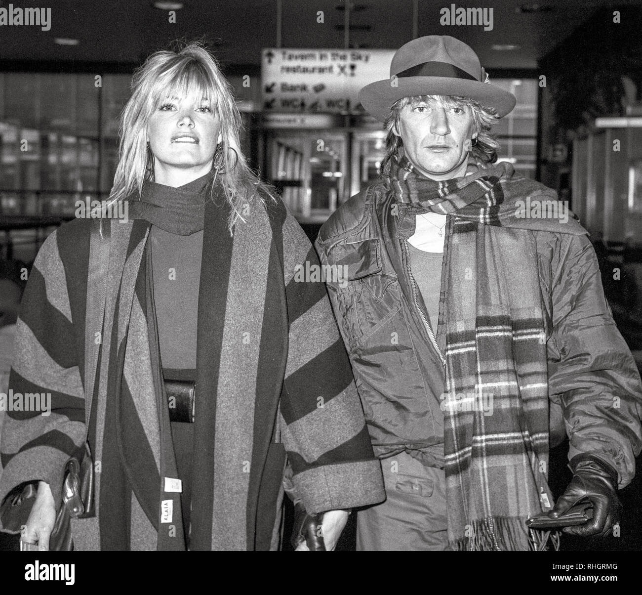 British Rock singer Rod Stewart and girlfriend Kelly Emberg at Heathrow ...