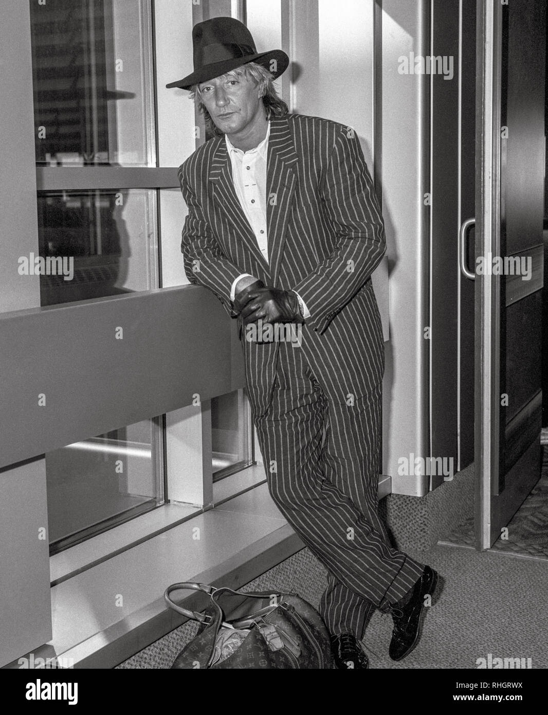British Rock singer Rod Stewart arriving at Heathrow Airport in March ...