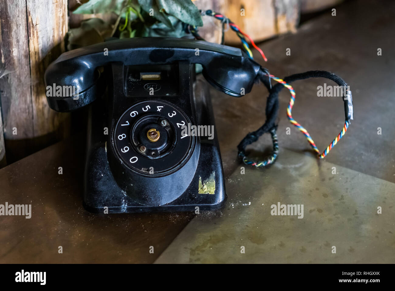 old black vintage telephone on a table, Retro in the