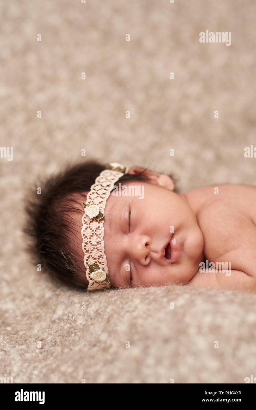 Sleeping newborn baby on bed hires stock photography and images Alamy
