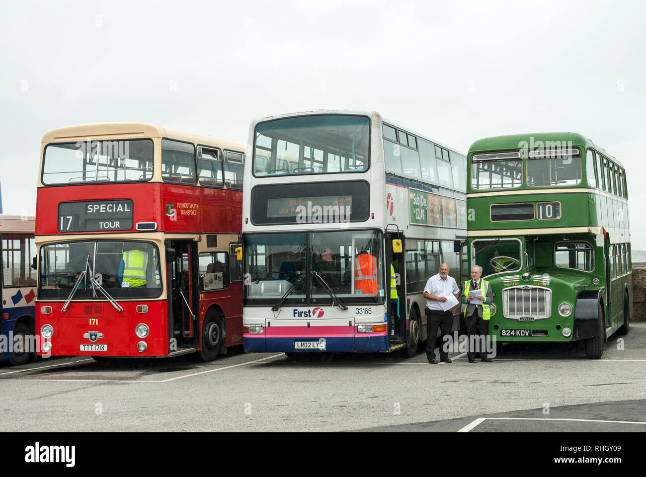 A row of colourful classic buses including Bristol Lodekka in Western National colours. Stock Photo