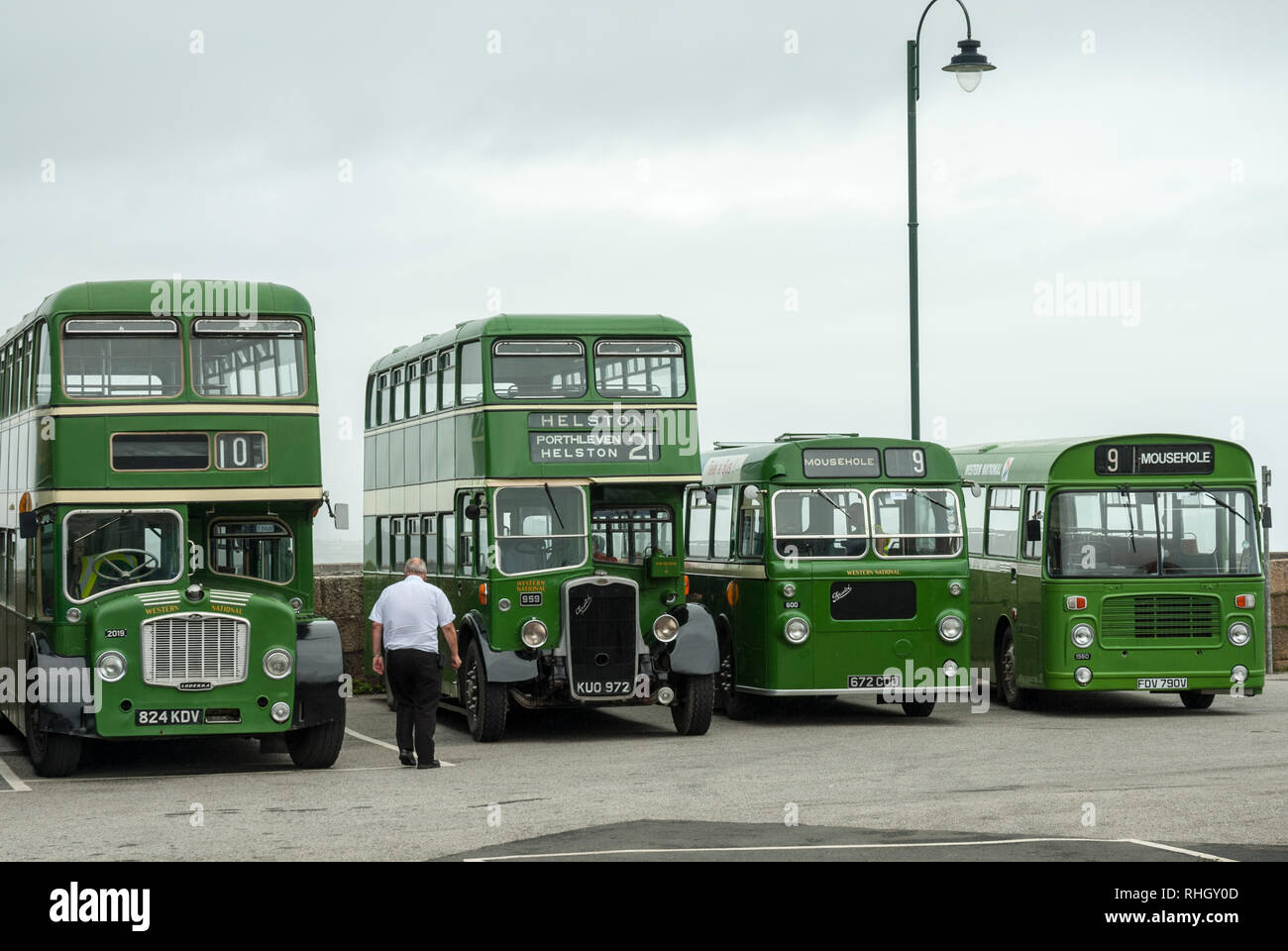 A row of classic buses and coaches in the Western National colours including Bristol Lodekka and Bristol LHS. Stock Photo