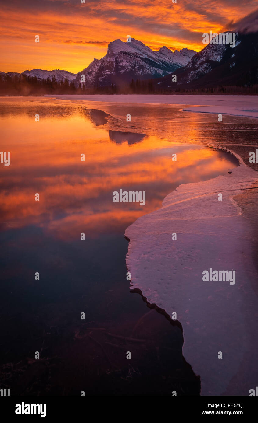 A beautiful sunrise in Banff, Canada. Located at Vermillion Lakes with Mt Rundle looming over. Stock Photo