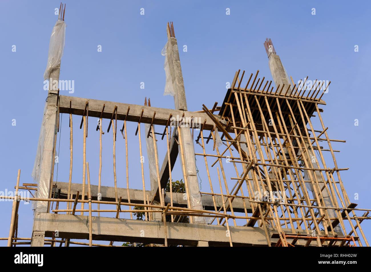 building pole pillar with steel & cement concrete under construction