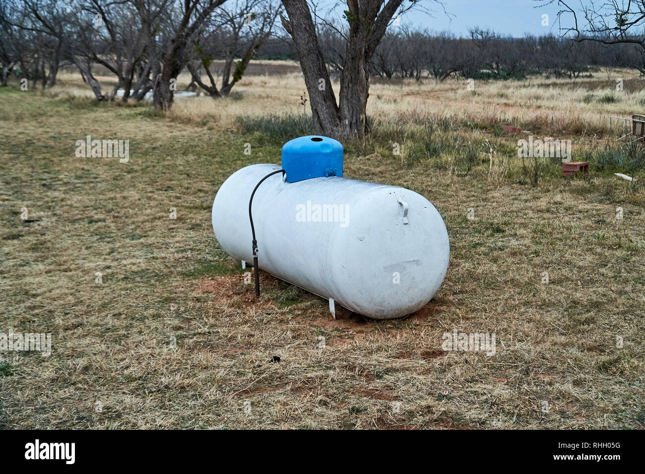 Lone propane tank on Texas Ranch Stock Photo