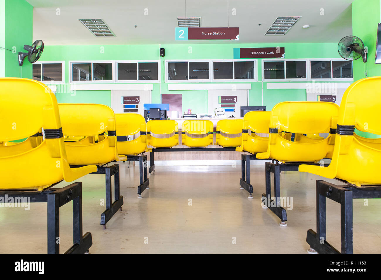 Orthopedic examination room, Empty yellow chairs waiting for