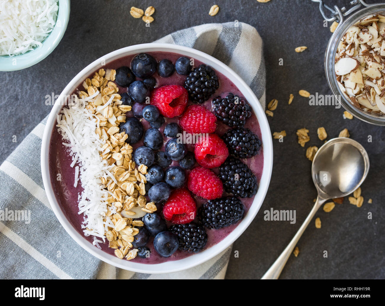 Aerial view of berries and granola in acai yogurt bowl. Stock Photo