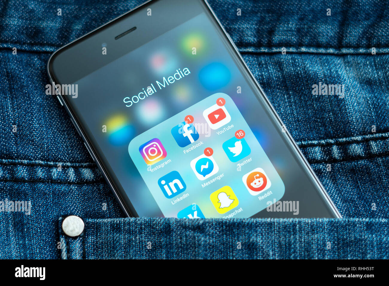 iPhone with icons of social media: instagram, youtube, reddit, facebook,  twitter, snapchat on the screen. Social media icons. Denim jeans background  Stock Photo - Alamy