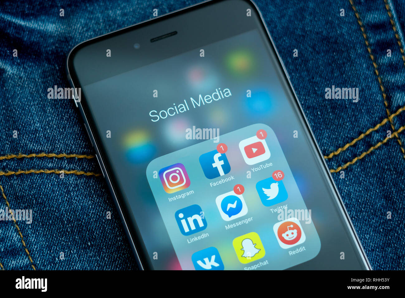 iPhone with icons of social media: instagram, youtube, reddit, facebook,  twitter, snapchat on the screen. Social media icons. Denim jeans background  Stock Photo - Alamy