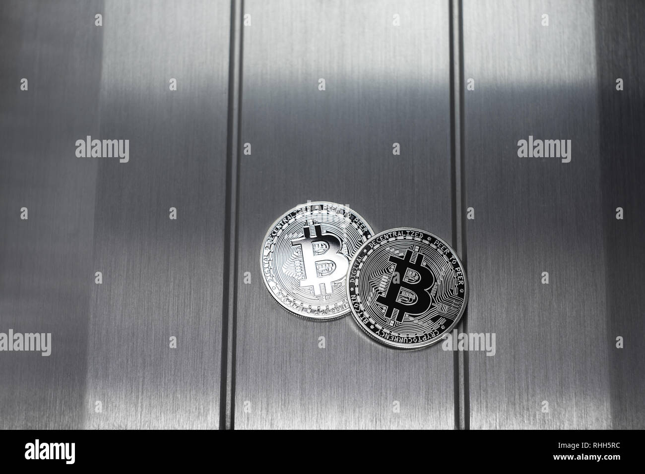 Bitcoin real metal coin is on one hundred dollars bills or banknotes. It  means hot price or value and high exchange rate of crypto currency on  market Stock Photo - Alamy