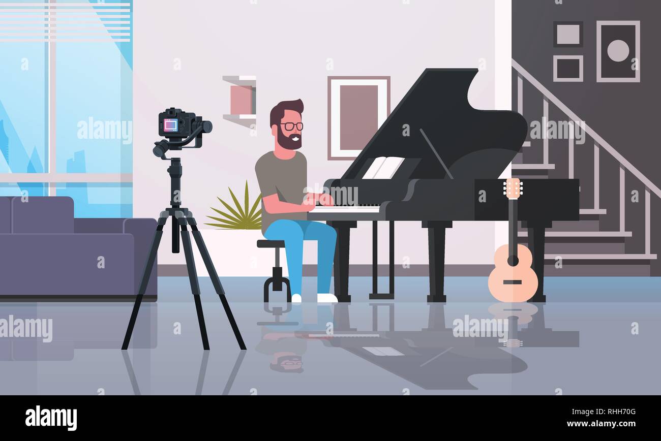 guy musical blogger recording video on camera man playing classical