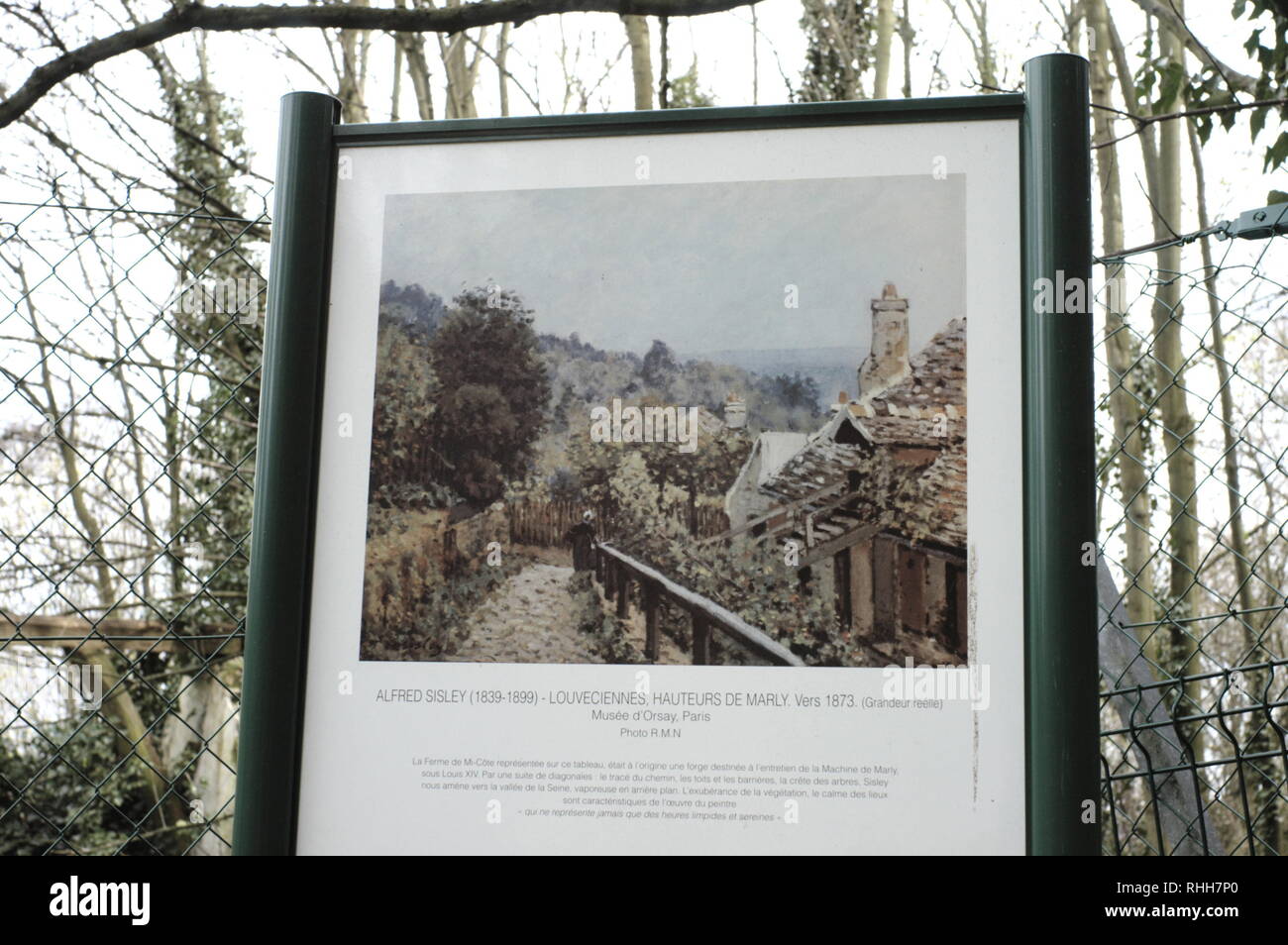 AJAXNETPHOTO. LOUVECIENNES, FRANCE. - SISLEY PAINTING - INFORMATION PANEL FOR THE PAINTING BY IMPRESSIONIST ARTIST ALFRED SISLEY ENTITLED 'LOUVECIENNES, HAUTEURS DE MARLY VERS 1873', OR 'SENTIER DE LA MI-COTE' AT THE SPOT ON THE FOOTPATH LEADING TO THE SEINE FROM WHERE THE ARTIST MADE THE PAINTING. ORIGINAL IS IN THE MUSEE D'ORSAY. PHOTO:JONATHAN EASTLAND/AJAX REF:R60904 296 Stock Photo