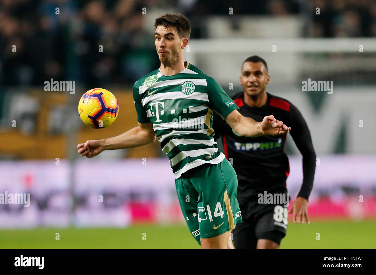 BUDAPEST, HUNGARY - MARCH 2: (r-l) David Markvart of DVTK controls the ball  next to Roland Varga of Ferencvarosi TC during the Hungarian OTP Bank Liga  match between Ferencvarosi TC and DVTK