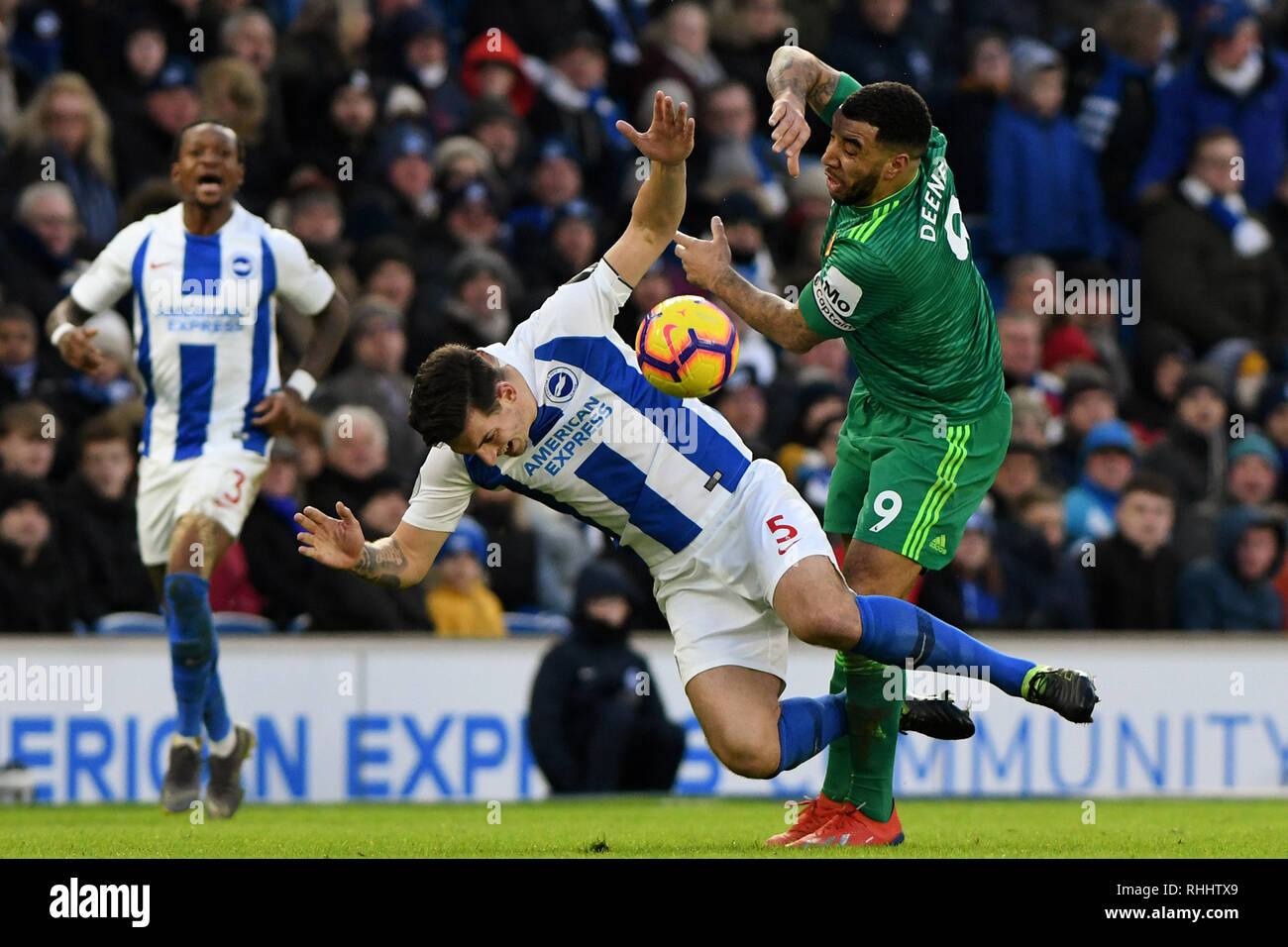Troy Deeney of Watford and Lewis Dunk of Brighton & Hove Albion battle for the ball - Brighton & Hove Albion v Watford, Premier League, Amex Stadium, Brighton - 2nd February 2019  Editorial Use Only - DataCo restrictions apply Stock Photo