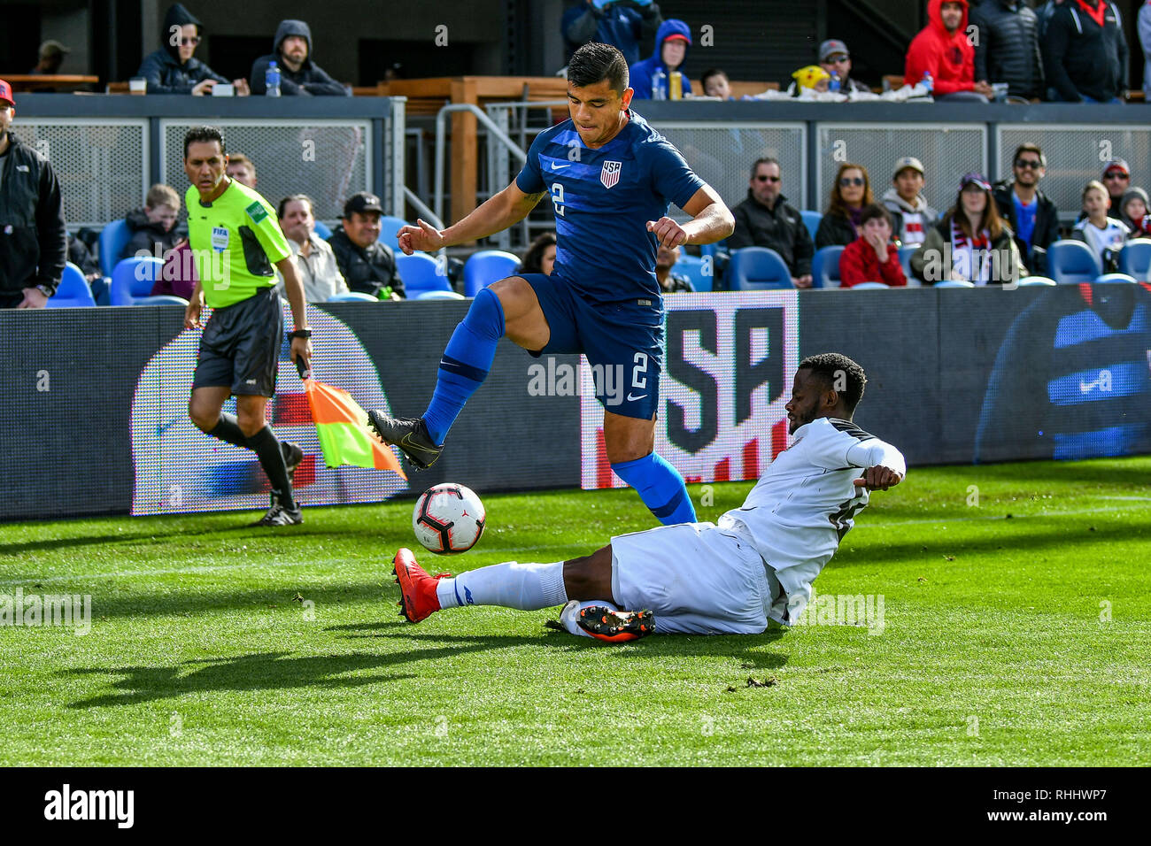 San Jose, California, USA. 2nd Feb, 2019. Costa Rica defender Waylon Francis (12) slides in to knock a ball away from Unites States defender Nick Lima (2) during the international friendly soccer match between Costa Rica and the United States at Avaya Stadium in San Jose, California. Chris Brown/CSM/Alamy Live News Stock Photo