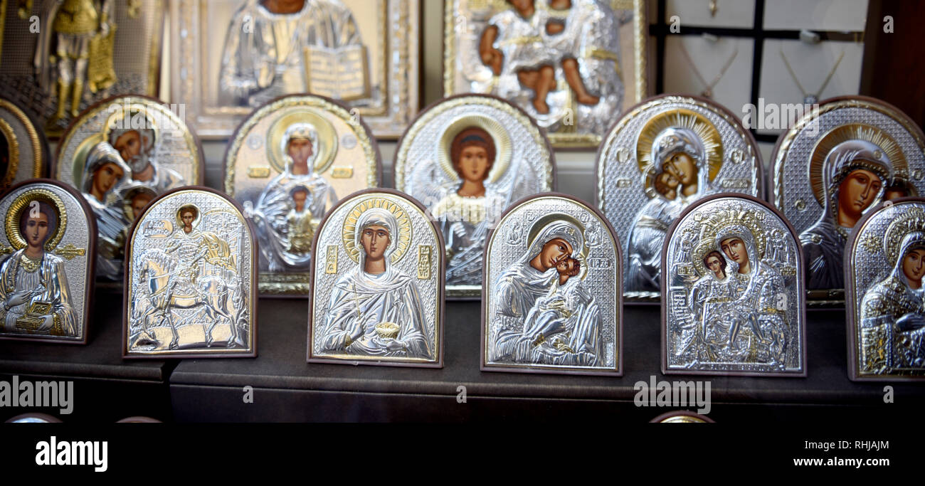 Display of traditional Greek silver object d'art which are icons in a ...