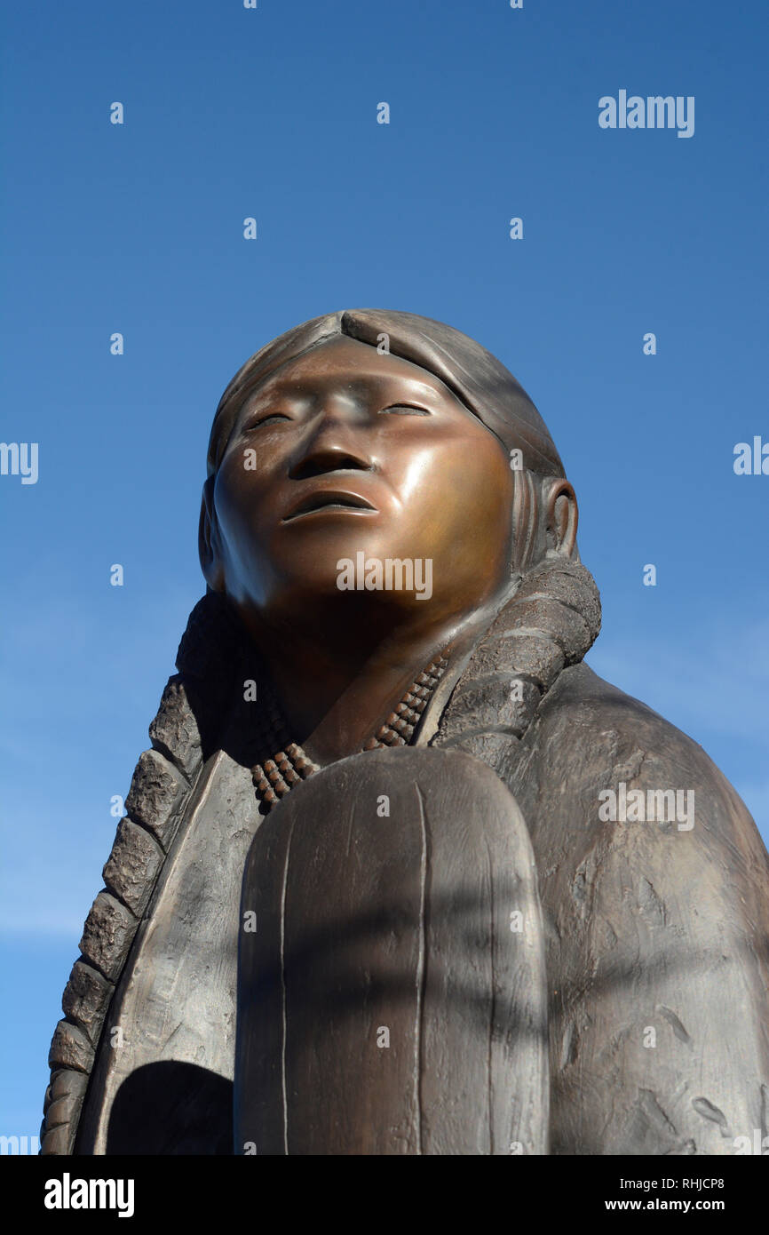 A bronze sculpture of a Native American woman by Chiricahua Apache