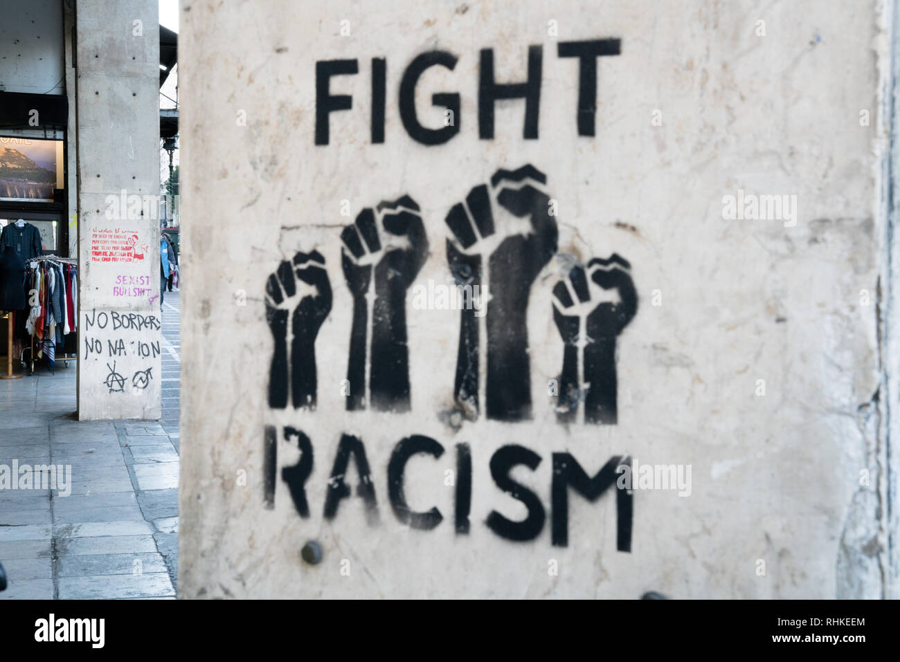 Stencil that says Fight Racism, No Borders, No Nation Stock Photo Alamy