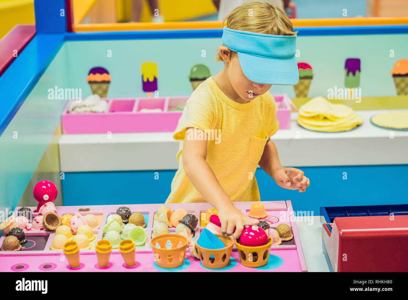 Children play as ice cream seller. Stock Photo