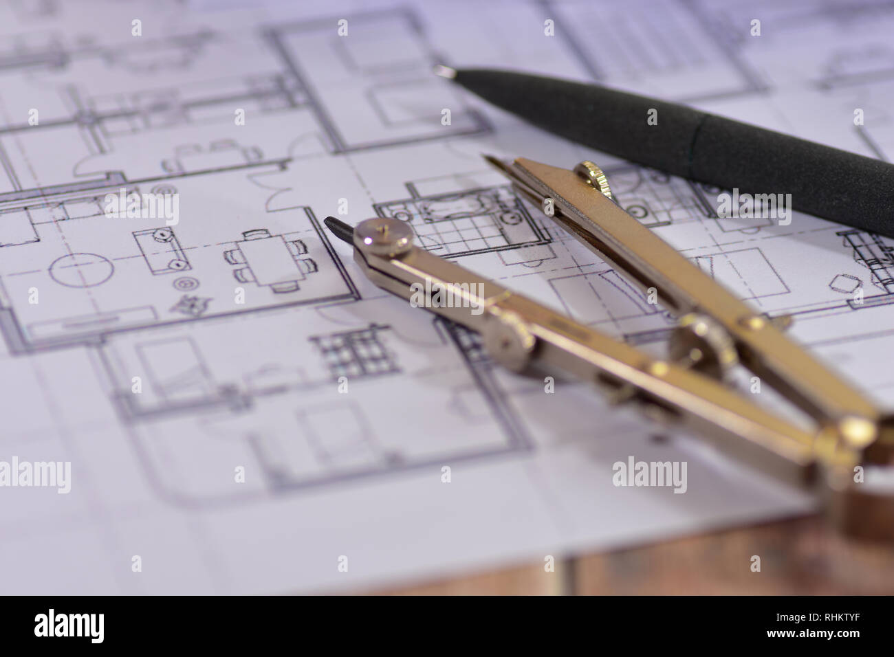 Architects drawings on a wooden table Stock Photo