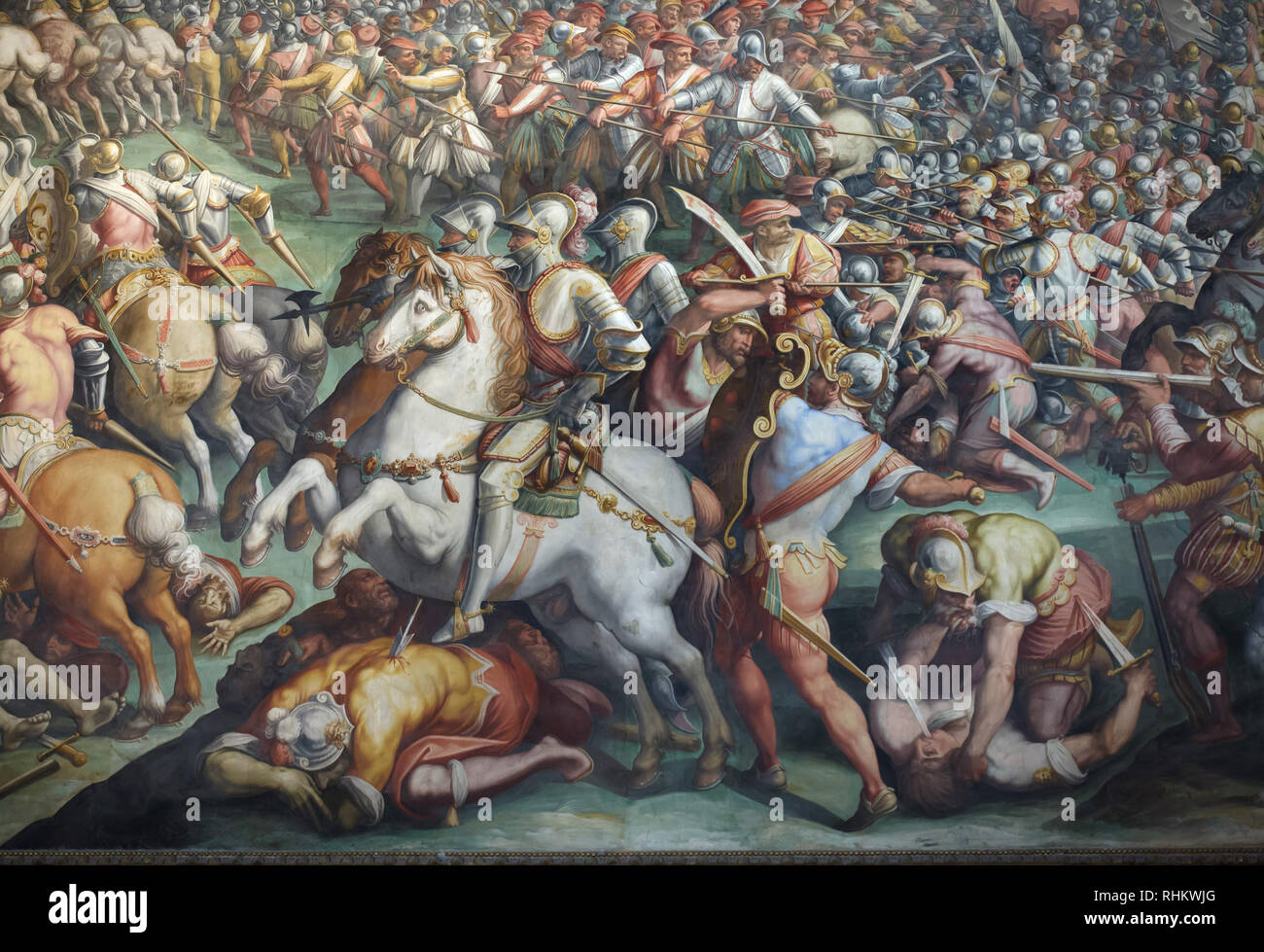 Battle of Marciano on 2 August 1554 depicted in the fresco by Italian Mannerist painter Giorgio Vasari and his assistants Giovanni Battista Naldini and Jacopo Zucchi (1570-1571) in the Hall of the Five Hundred (Salone dei Cinquecento) in the Palazzo Vecchio in Florence, Tuscany, Italy. Stock Photo