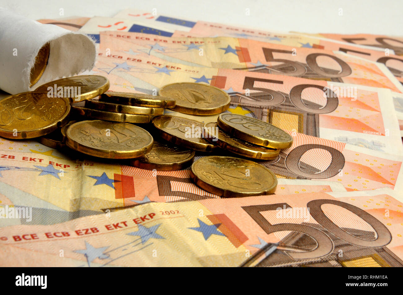 Euro notes and coins Stock Photo